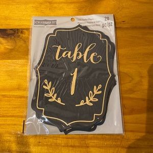 Celebrate It.  Table numbers 1-20. Black with gold lettering. Never used.